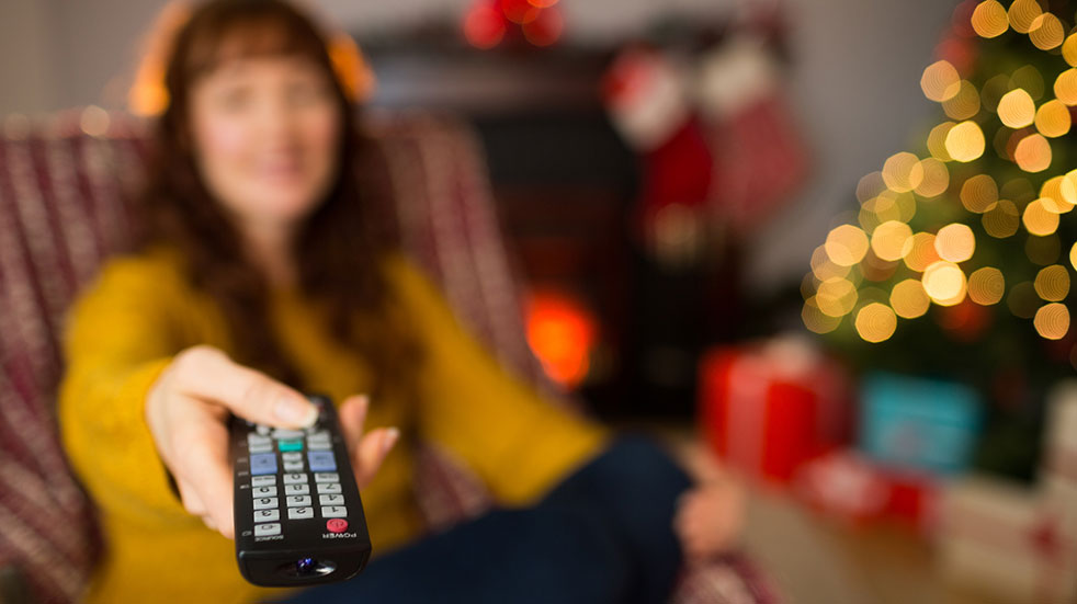 Christmas to do list woman holding remote control Christmas